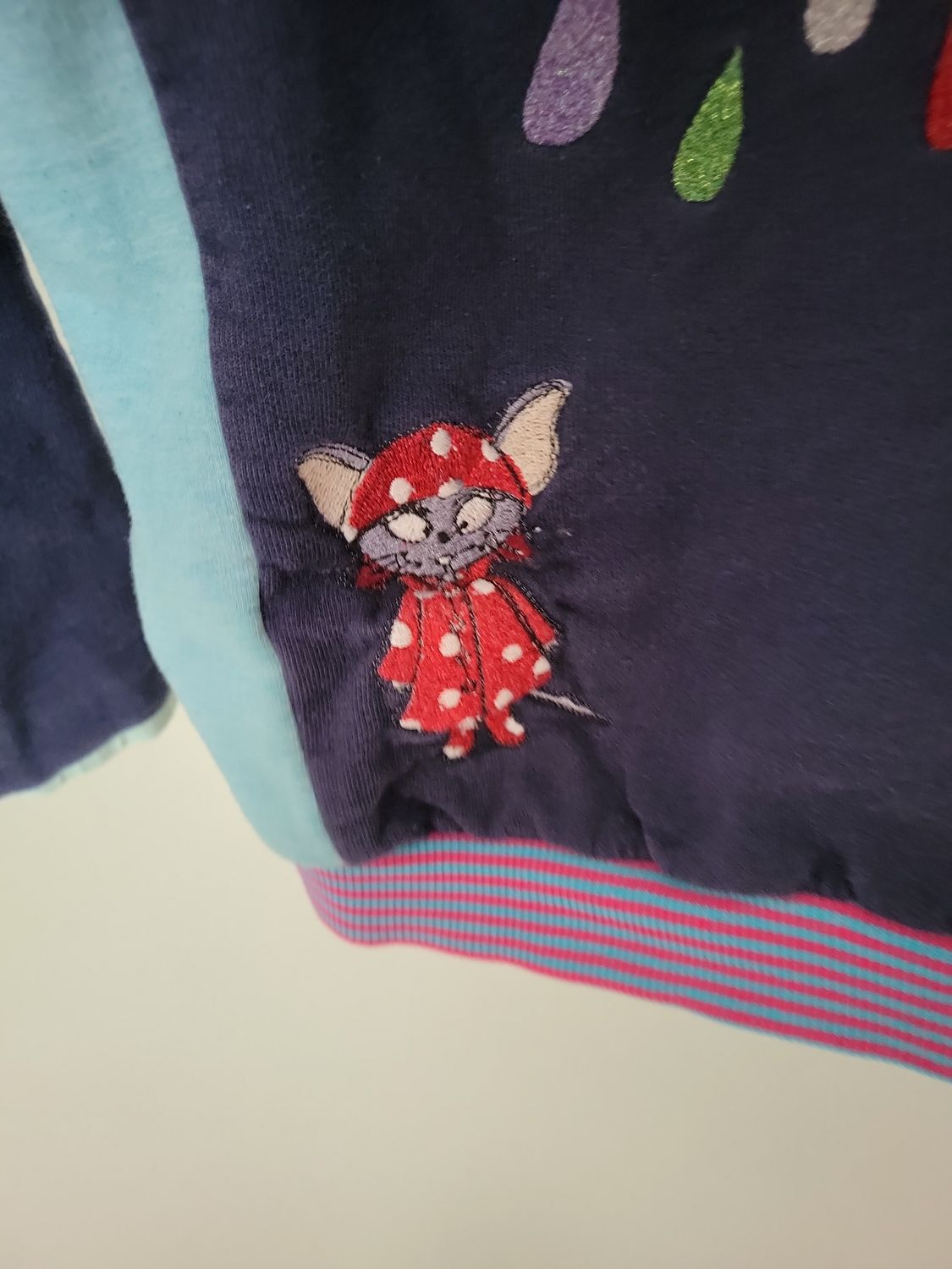 Bunte Wende Kinder-Sweatjacke mit Regenschirm-Motiv und Kapuze Gr 104